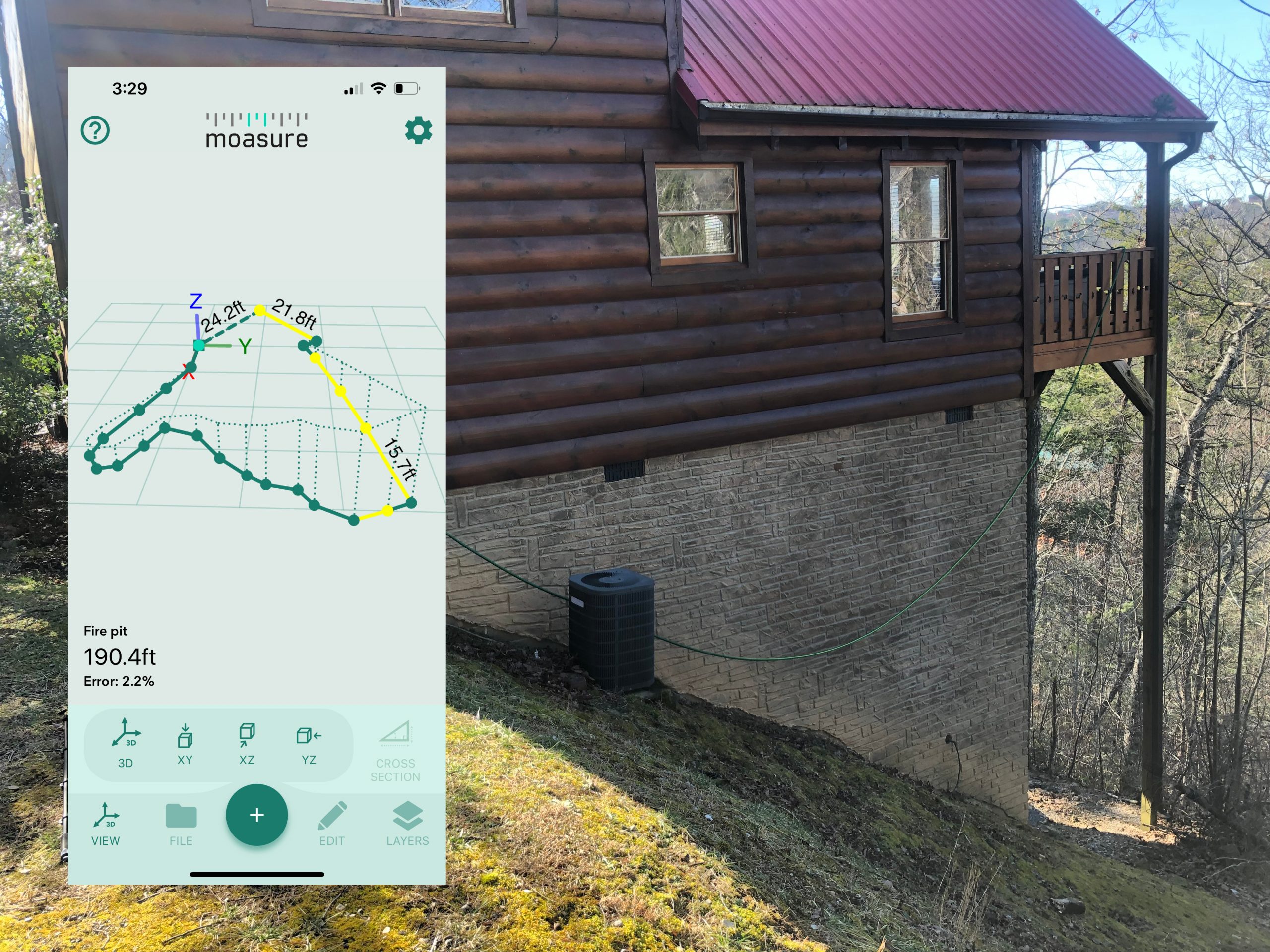 Moasure app on iPhone with mapped area of sloped side yard and main house.