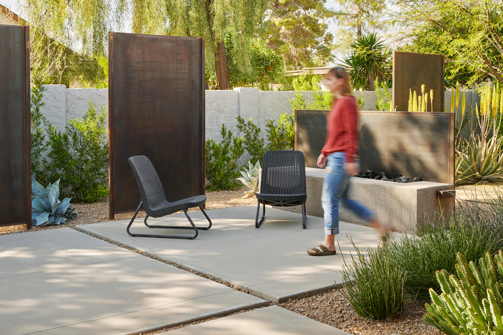 TRUEFORM Landscape Architects include native desert plants near weathered corten panels.