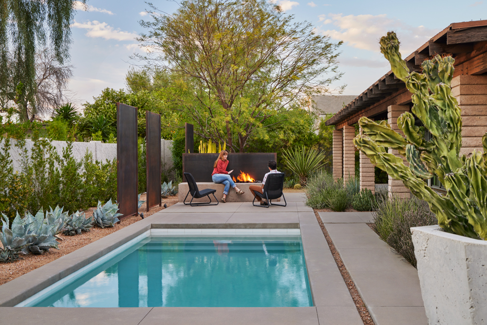 TRUEFORM Landscape Architects include native desert plants around firepit and sunken pool.
