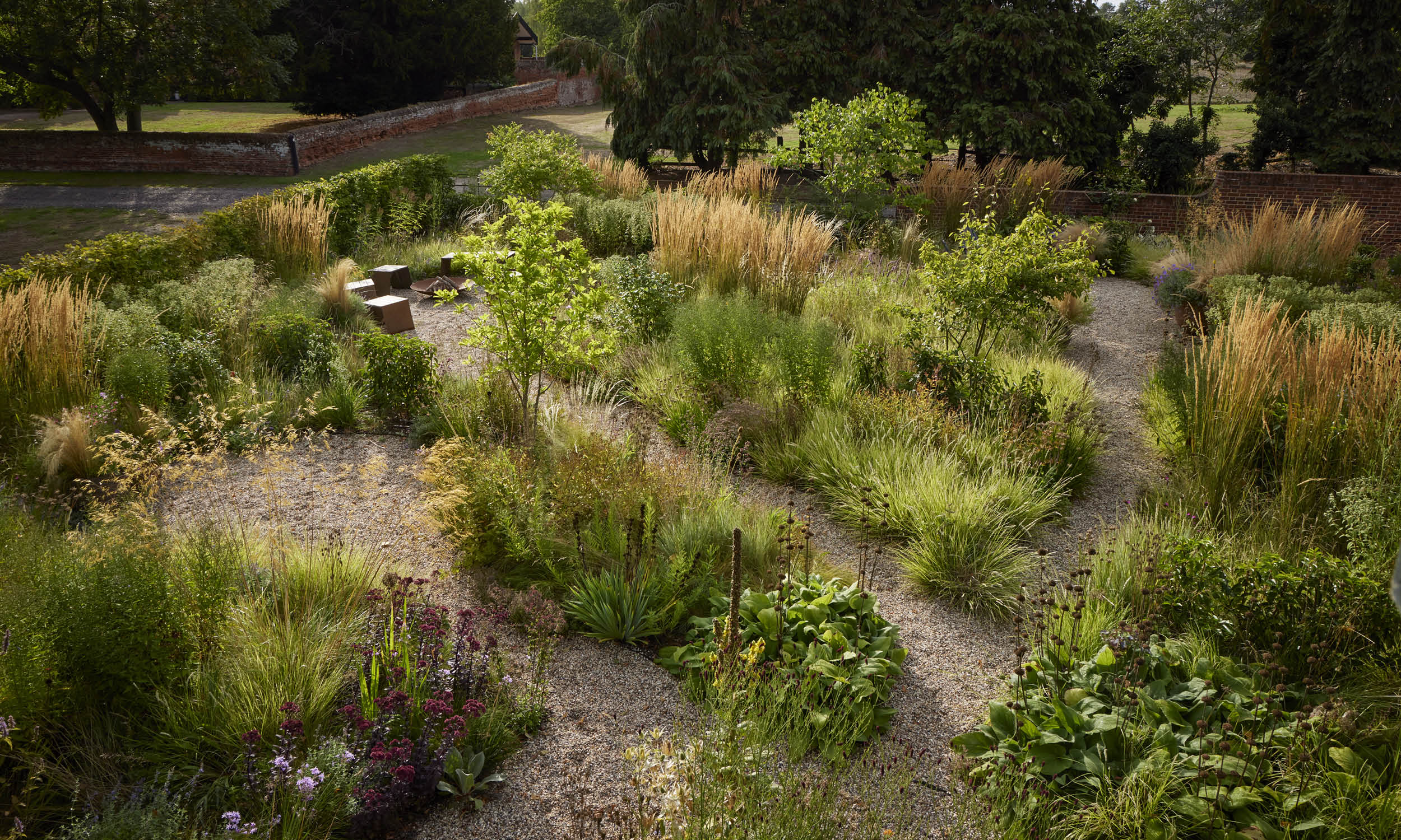 Stefano Marinaz creates naturalistic garden with meandering paths.