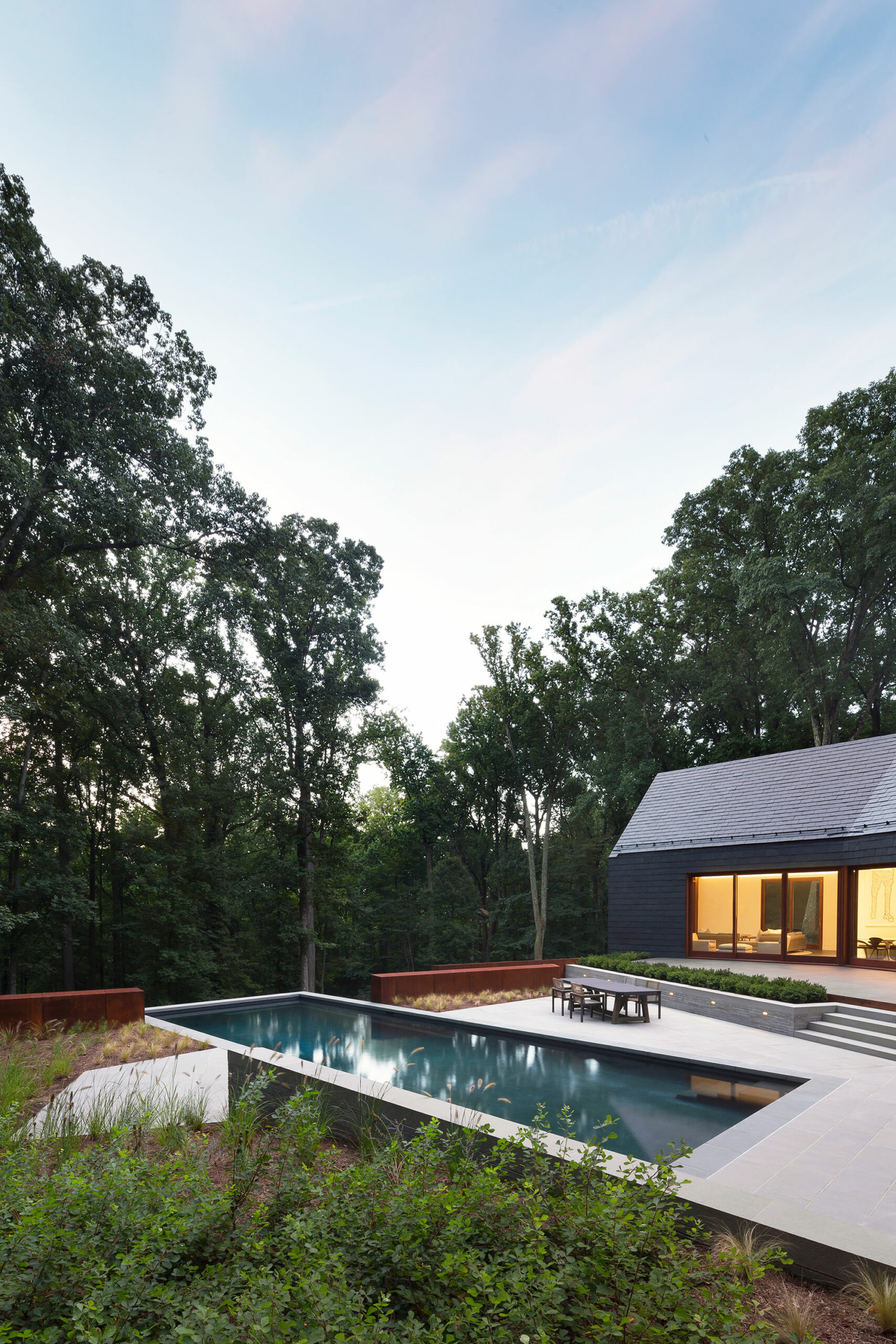 Campion Hruby Integrates Modern Home with Dense Woodlands